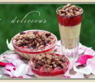 Vanilla custard with strawberry puree and granola | 487 Views | Fame 121.75